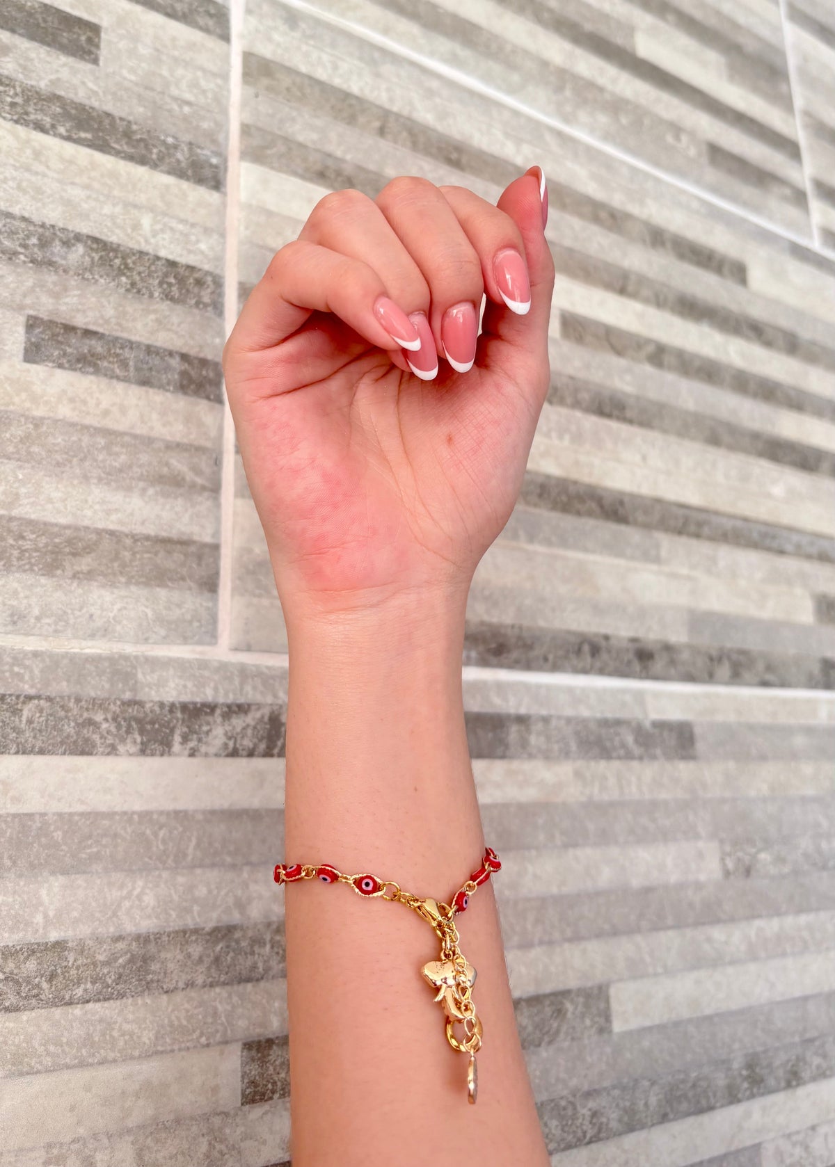 INFYNIA | Pulsera Ojo Turco Roja + Elefante